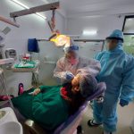 Dentists operating on patients at Jain Dental HospitalΒ Indirapuram, Ghaziabad & Noida, India