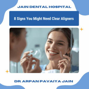 Person checking their smile with clear aligners in hand, representing signs you may need clear aligner treatment.