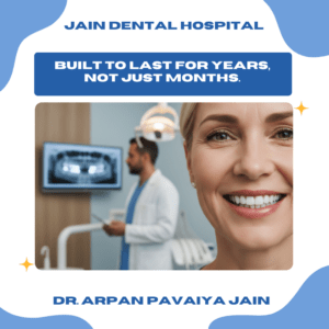 Dentist reviewing dental X-ray while a patient smiles confidently, representing long-term durability and lifespan of dental implants