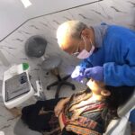 Dr Arpan jain diagnosing a patient